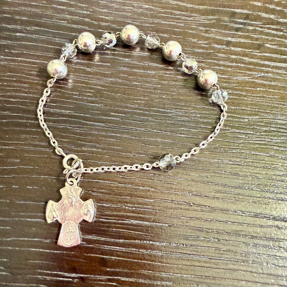 Rosary prayer bracelet, string of beads arranged in a decade (a set of 10)